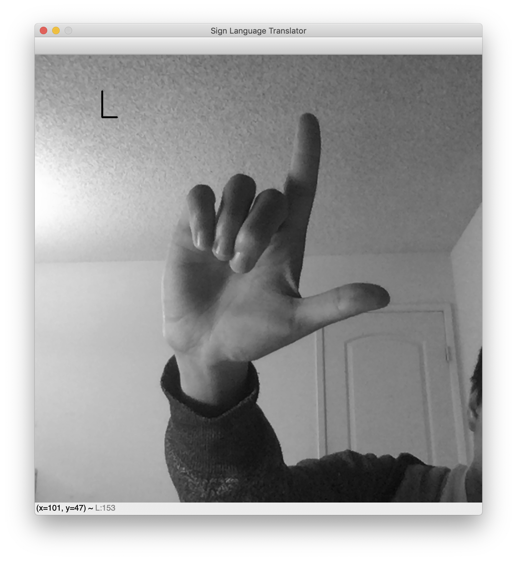 示例 OpenCV 程序的屏幕截图，用于手语“L”。