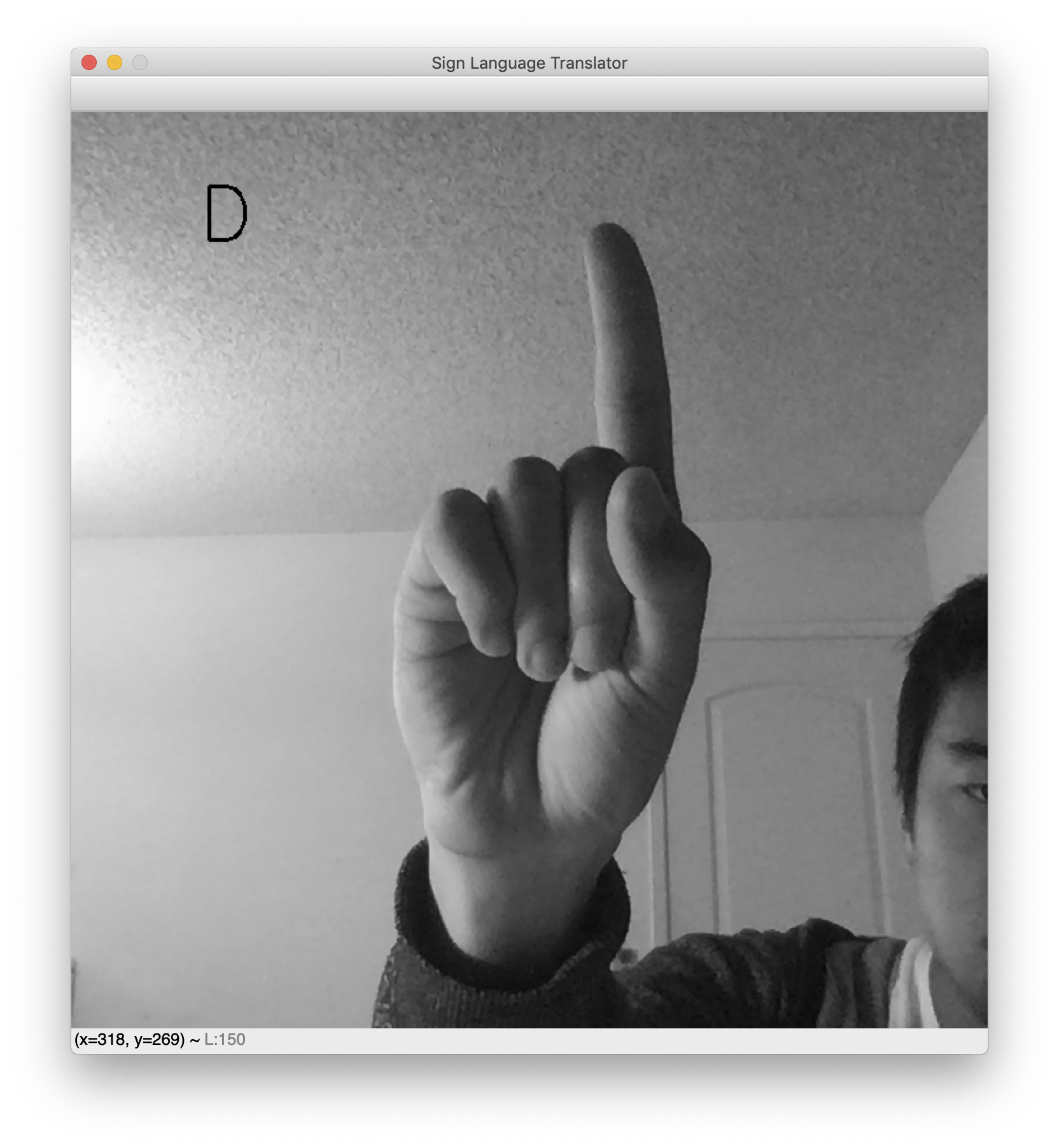 您的示例 OpenCV 程序的截图，用于手语“D”